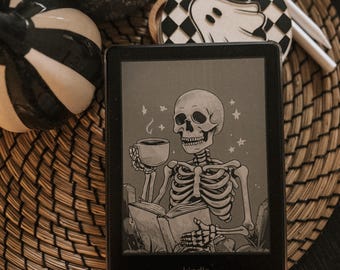 kindle paperwhite full screen lock screen -  skeleton coffee and book