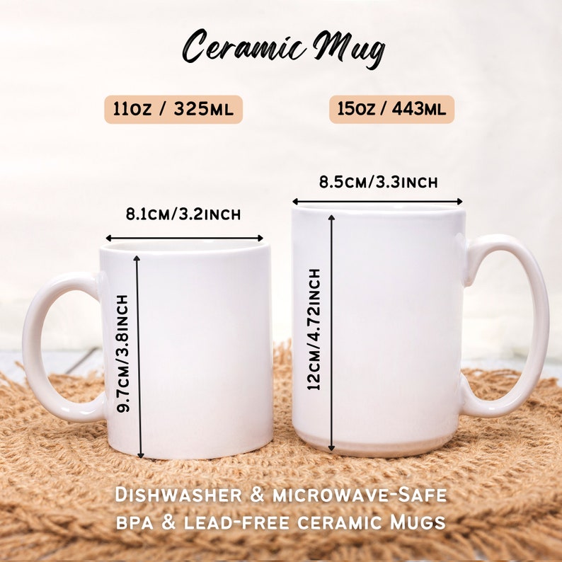 May include: Two white ceramic mugs with measurements in inches and ounces. The smaller mug is 11 ounces and the larger mug is 15 ounces. Both mugs are dishwasher and microwave safe.