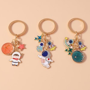 Suministros para llaveros, llavero con anillas de cadena, fabricación de llaveros, llavero de astronauta de dibujos animados, llavero de planeta, accesorio para mochila