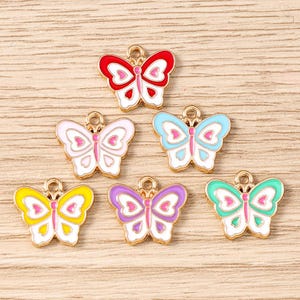 10 stks cartoon kleurrijke vlinders emaille bedel, doe-het-zelf handgemaakte oliedruppelhanger, kleine creatieve charme, sieraden bedels voor oorbel ketting maken