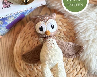 May include: A crocheted owl amigurumi toy with brown wings, white body, and yellow feet. The owl is sitting on a woven wicker mat. The text "PDF CROCHET PATTERN" is on a green circle in the background.