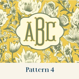 May include: A set of three ceramic nesting bowls in shades of blue, green, and white. The bowls feature a speckled glaze and a simple, modern design. The largest bowl measures approximately 6 inches in diameter.