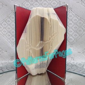 Book folding pattern for a POPPY