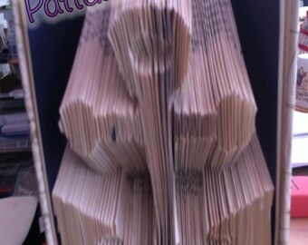 Patrón de plegado de libro para un ANCLA