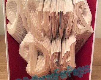 Book folding pattern for MUM&DAD in a fancy font