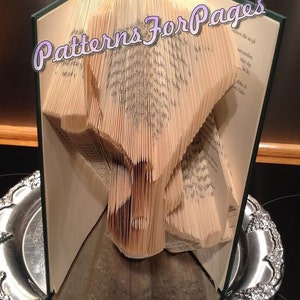 Book folding pattern for a GUITAR and MUSIC NOTES
