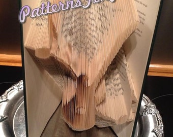 Book folding pattern for a GUITAR and MUSIC NOTES