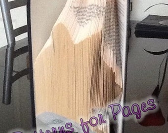 Book folding pattern for a CAT'S HEAD