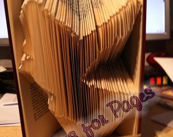 Book folding pattern for a DOVE