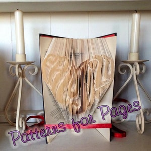 Book folding pattern for FAMILY in the shape of a Heart