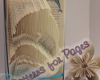 Book folding pattern for a DOLPHIN on the waves