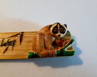 Hand-carved and painted Indonesian wildlife Bookmark Little Fireface Project Nocturnal Pangolin, Slender Loris or Slow Loris