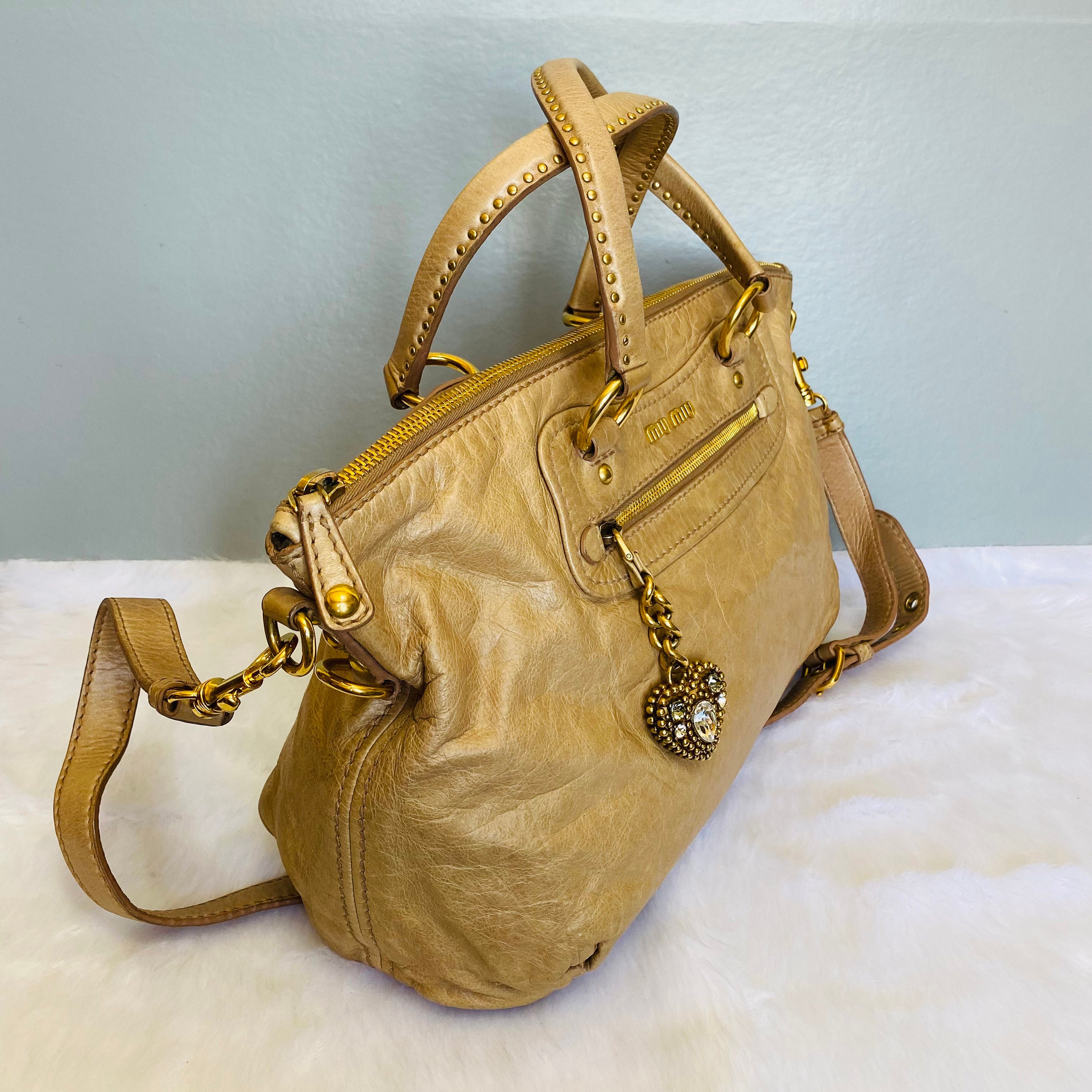 Miu Miu Vitello Lux Handbag RT0383 Beige Leather Pony-style calfskin  ref.945916 - Joli Closet