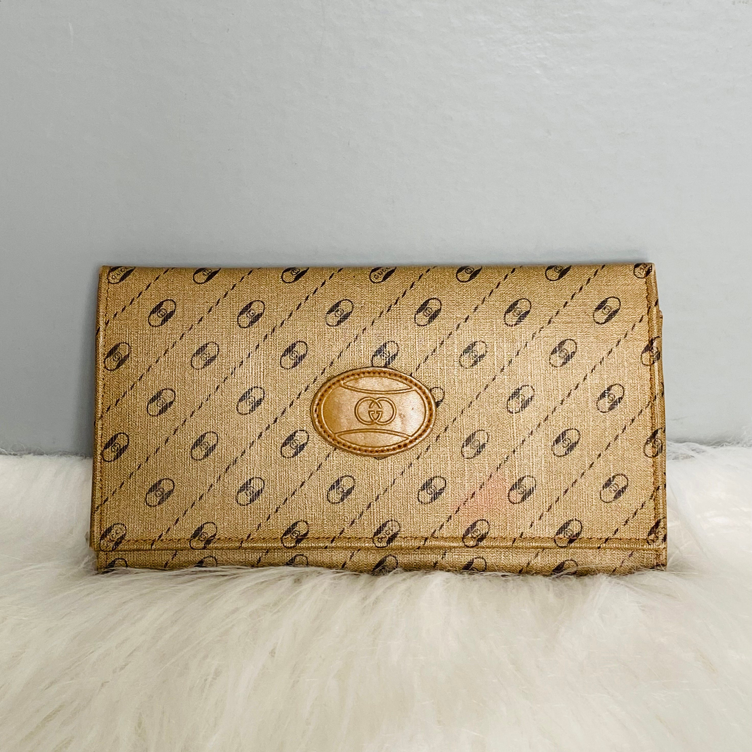 Authentic Gucci GG Brown Leather & Canvas New Britt Bi-Fold Wallet –  Vanilla Vintage