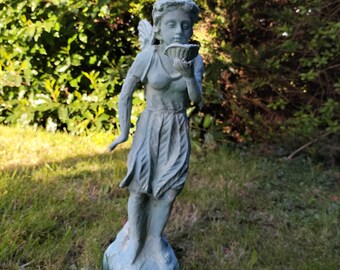 Large rusty cast iron fairy with verdigris garden statue ornament