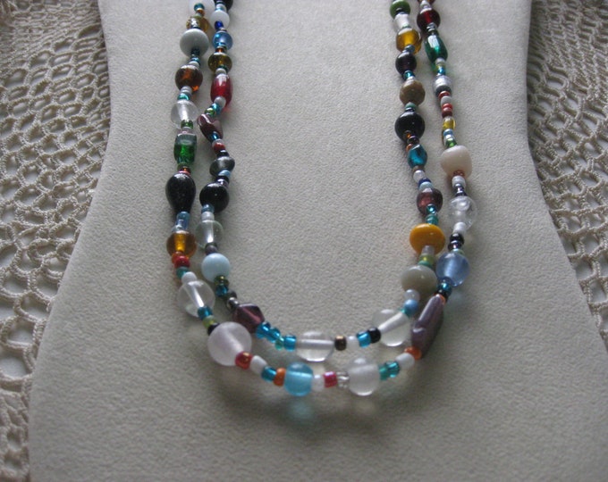 glass mardi gras beads history