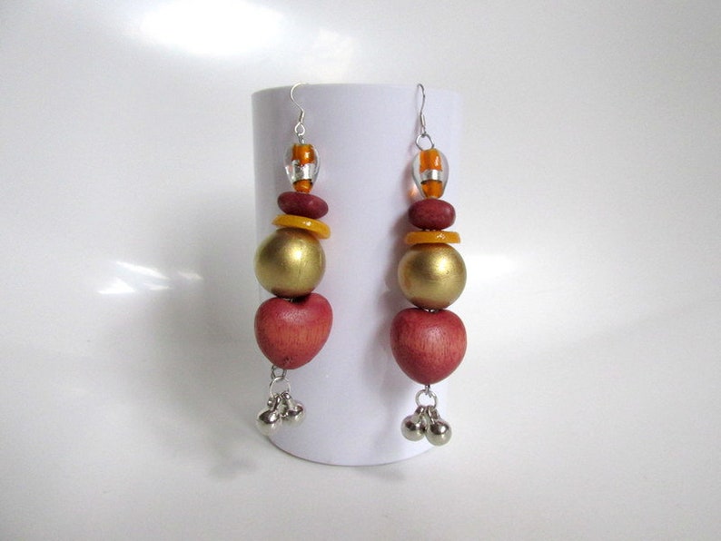 krobo slice beads earring long chunky tribal earring heart shape wood bead silver and charms 3.75 inches long. Africa beads earring