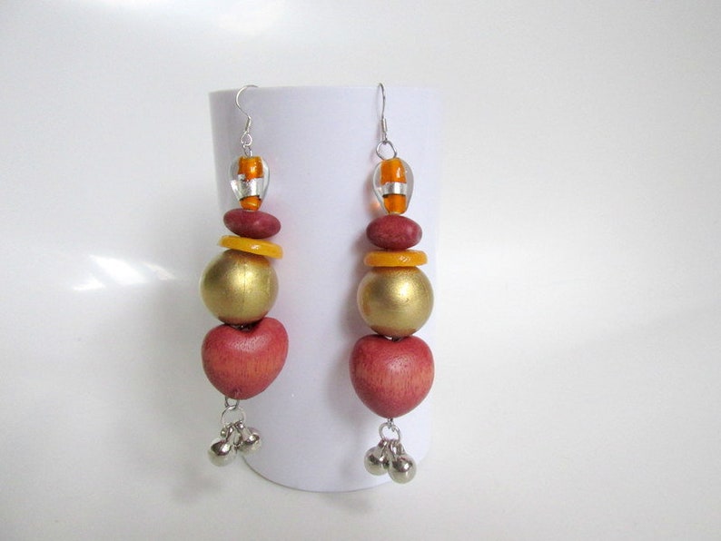 krobo slice beads earring long chunky tribal earring heart shape wood bead silver and charms 3.75 inches long. Africa beads earring