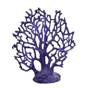 May include: A decorative, purple coral sculpture with a textured surface. The coral has a tree-like structure with many branches and a rounded base. The sculpture is made of a solid material and is set against a white background.