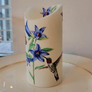Led Pillar Candle With Hummingbirds And Butterflies Among The Flowers