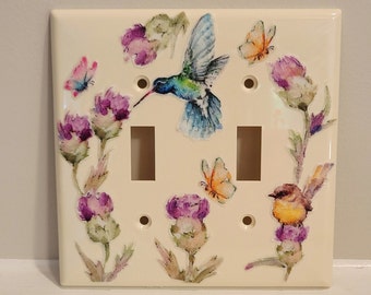 Light Switch Plate With A Hummingbird, Songbird And Butterflies On The Thistle Flowers