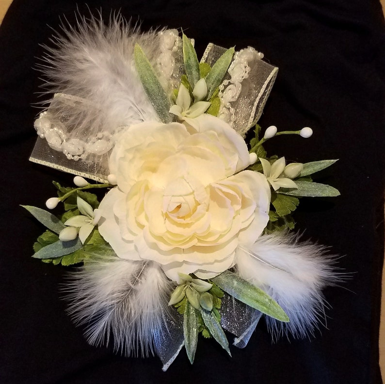 Lace Bridal Corsages With Beautiful Cream Colored Rose Greenery And A Shimmery Ribbon
