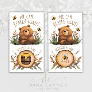 May include: Two brown bear scratch off cards with the text "We can bearly wait!" and a honey pot or a bee with the text "Sorry" underneath. The cards are decorated with bees and leaves.