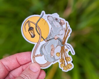 May include: A gray rat with a long tail is holding onto a stick with a lantern on it. The rat is sitting on a bed of yellow flowers. The background is a yellow circle with a white outline.