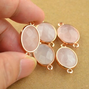 Naturlig rosenkvarts rosa kristall oval fasetterad kontaktram oval form guldpläterad kant 14 x 24 mm inklusive dubbel bezel
