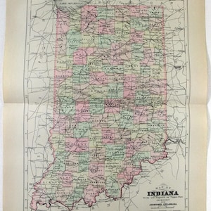 May include: A vintage map of Indiana, featuring county boundaries in various colors. The map includes the text "Map of Indiana" and "Johnson's Cyclopedia". The map is printed on aged paper.