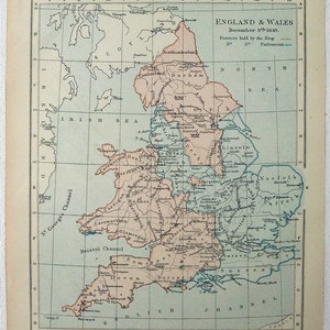 May include: A vintage map of England and Wales from December 9th, 1643, showing the districts held by the King and Parliament. The map is divided into counties and features a color-coded key to indicate which areas were controlled by each side.