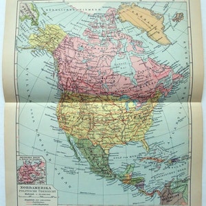 Könnte beinhalten: Eine detaillierte Vintage-Karte von Nordamerika mit politischen Grenzen und geografischen Merkmalen. Die Karte verwendet eine Farbpalette aus Rosa, Gelb, Grün und Blau. Text auf Deutsch ist sichtbar, einschließlich "Nordamerika" und "Politische Übersicht".