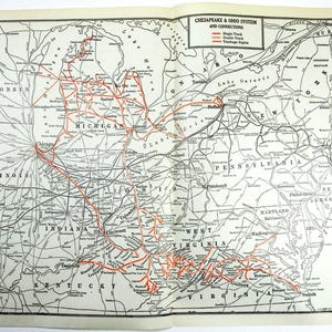 May include: A black and white map of the eastern United States showing the Chesapeake & Ohio System and Connections. The map shows single track, double track, and drainage rights.