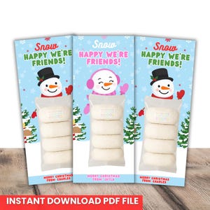 May include: Three Christmas-themed gift tags with a snowman design. Each tag features the text "Snow Happy We're Friends!" and "Merry Christmas From" followed by a name. The tags also include a clear bag of treats.