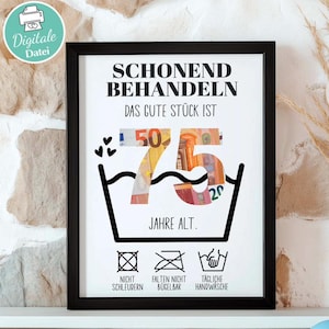 Może przedstawiać: Oprawiony wydruk z niemieckim tekstem i projektem, który zawiera walutę tworzącą liczbę 75. Tekst zawiera instrukcje pielęgnacji. Rama jest czarna.