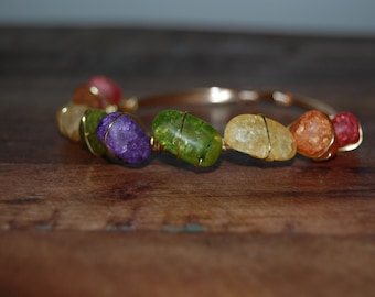 Wire wrapped beaded bracelet, gold with rainbow seaglass beads