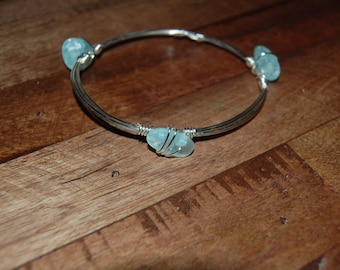 Wire wrapped beaded bracelet, silver with light blue seaglass beads