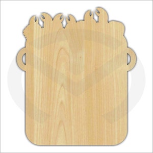 May include: A wooden cutting board shaped like a pot with a raised rim and handles. The top of the board is decorated with a cutout design of crabs.
