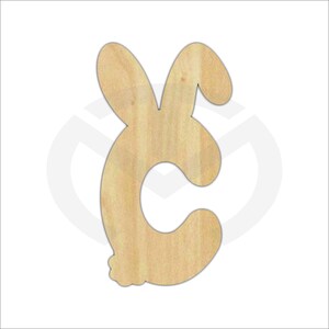 May include: Wooden cutout of the letter C shaped like a bunny rabbit. The bunny has long ears and a fluffy tail.