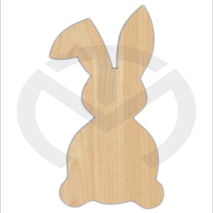 May include: A wooden cutout of a rabbit in a sitting position. The rabbit has long ears and a rounded body.