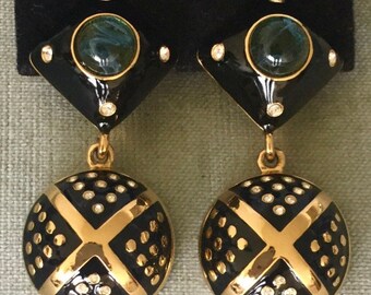 tear drop shape clip on earrings Runway vintage 80s Made by Essex. sculptured gold tone metal satin russian massive