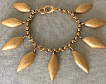 Avant-garde DKNY Donna Karan Signed Modernist LEAF CHARMS on Chain Bracelet Gold Metal Vintage Designer Runway Couture Big Floral Statement