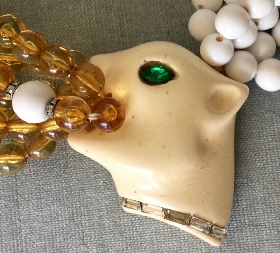 Multistrand ANGELA CAPUTI Lucite LIONs Head Bead Torsade Bib 