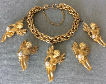 Stunning YOSCA Signed WINGED CHERUB Huge Angel Charms Bracelet Earrings Set Pearl Crystals Gold Metal Vintage Designer Runway Couture Love