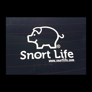 May include: White Snort Life logo on a black background. The logo features a cartoon pig with a snout and a curled tail. The text "Snort Life" is below the pig with the website address "www.snortlife.com" below the text.
