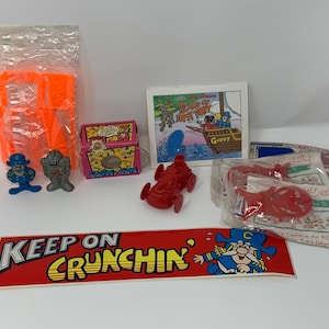 Cap’n Crunch Cereal Prize Lot - Figures Balloon Racer Cap’n Cam Magnifying Viewer Bumper Sticker