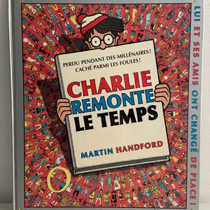 Charlie Remonte Le Temps by Martin Handford / Charlie Go Back in Time / Where’s Waldo French. Hardcover 1998.