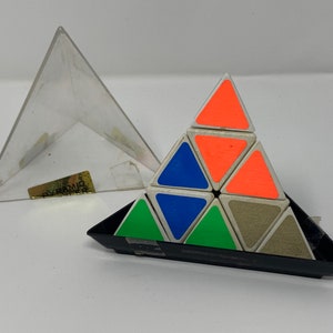 1981 Pyraminx Pyramid Puzzler Triangle Puzzle Rubik’s Cube type brain game toy