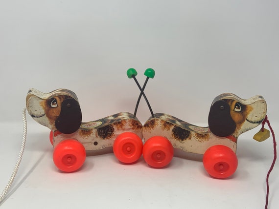 Fisher price pull 2025 dog vintage