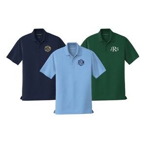 May include: Three polo shirts in different colors: navy blue, light blue, and forest green. Each shirt features a monogram embroidered on the left chest. The monograms are "CGM", "ASM", and "JRS".